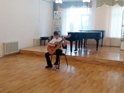  Гитарный вечер: магия звука и мастерства!